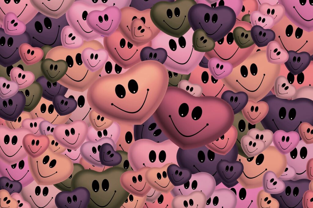 multi-colored hearts with smiling faces